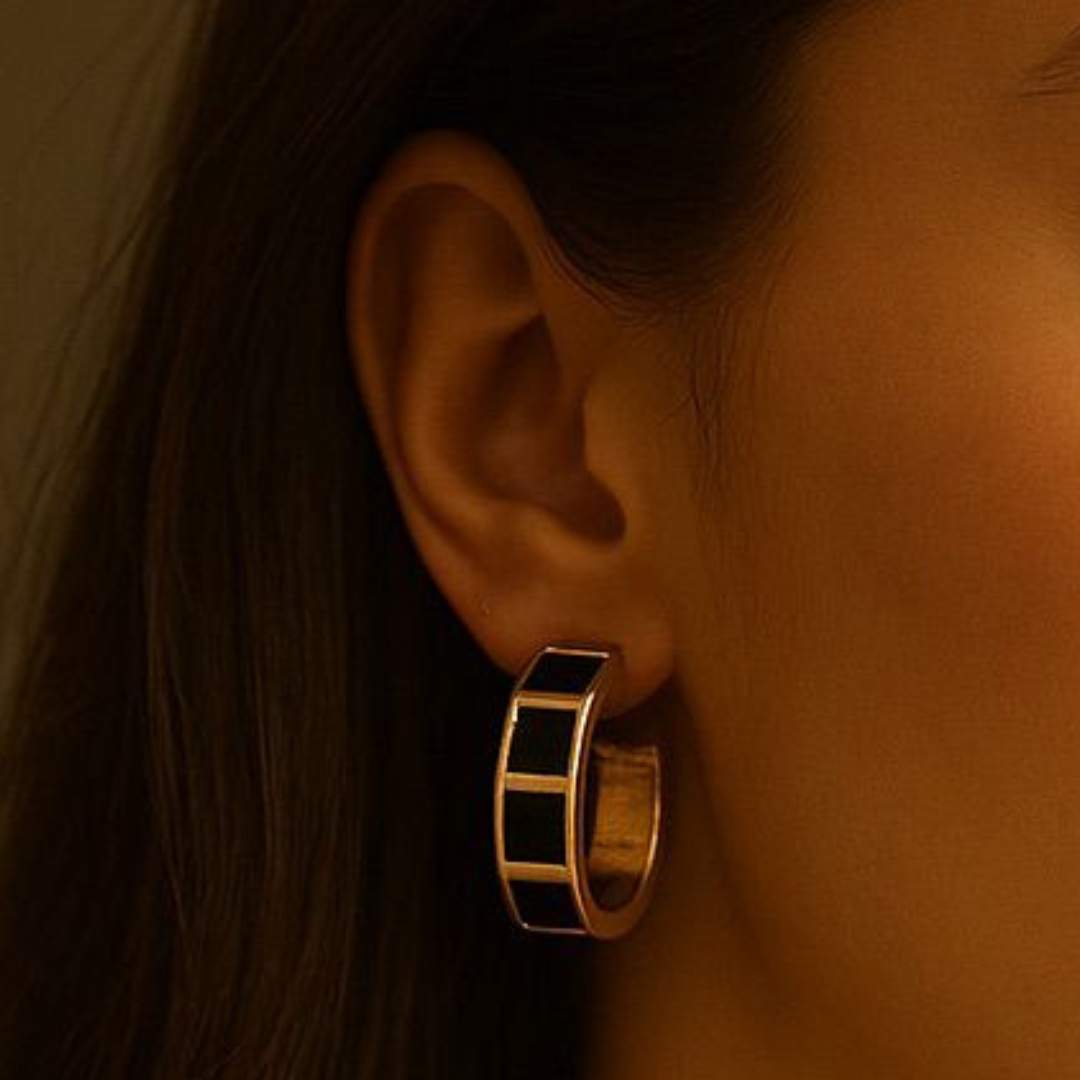 Carra Gold hoops earrings with black square pattern from House of Pehr