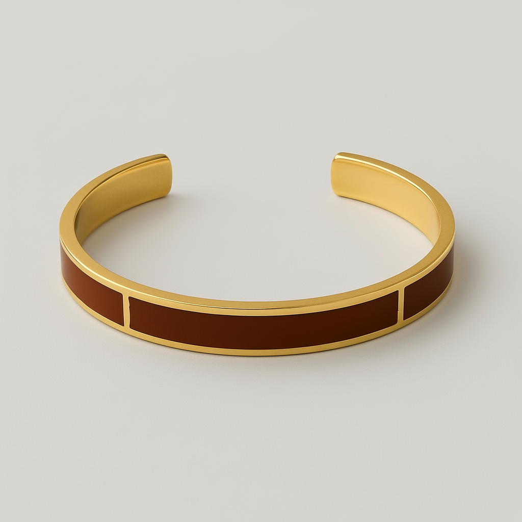 Gold and brown bracelet on a light gray background