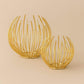 Two decorative Aura candle holders from House of Pehr