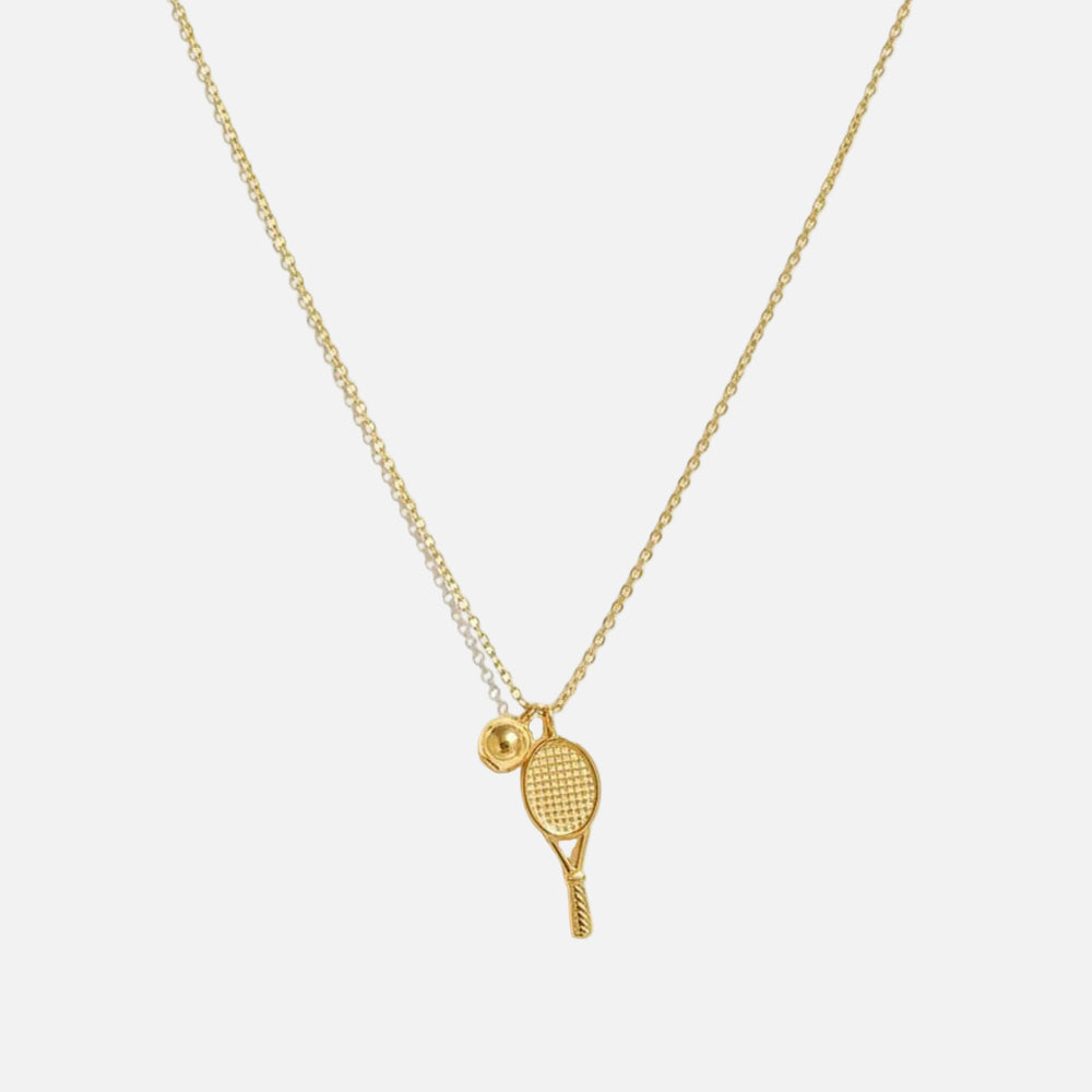 Gold necklace with tennis racket and ball pendant from House of Pehr - Image 1