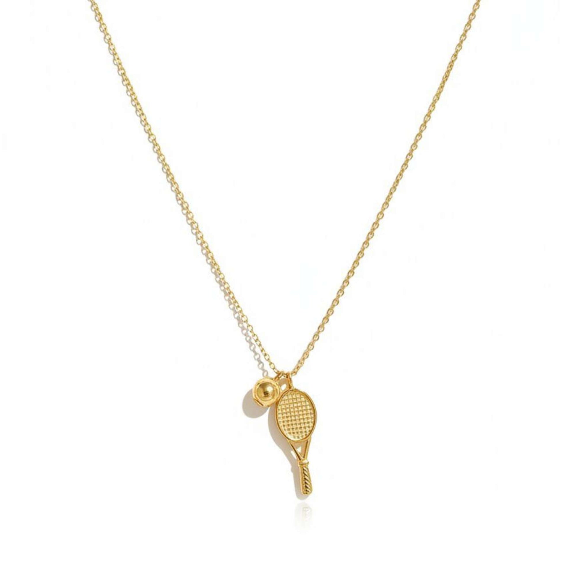 Gold necklace with tennis racket and ball pendant from House of Pehr