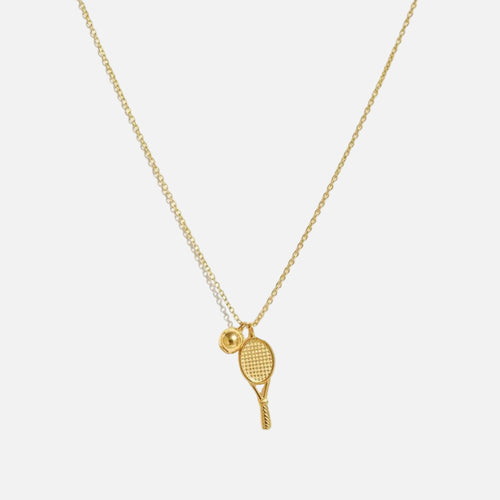 Gold necklace with tennis racket and ball pendant from House of Pehr