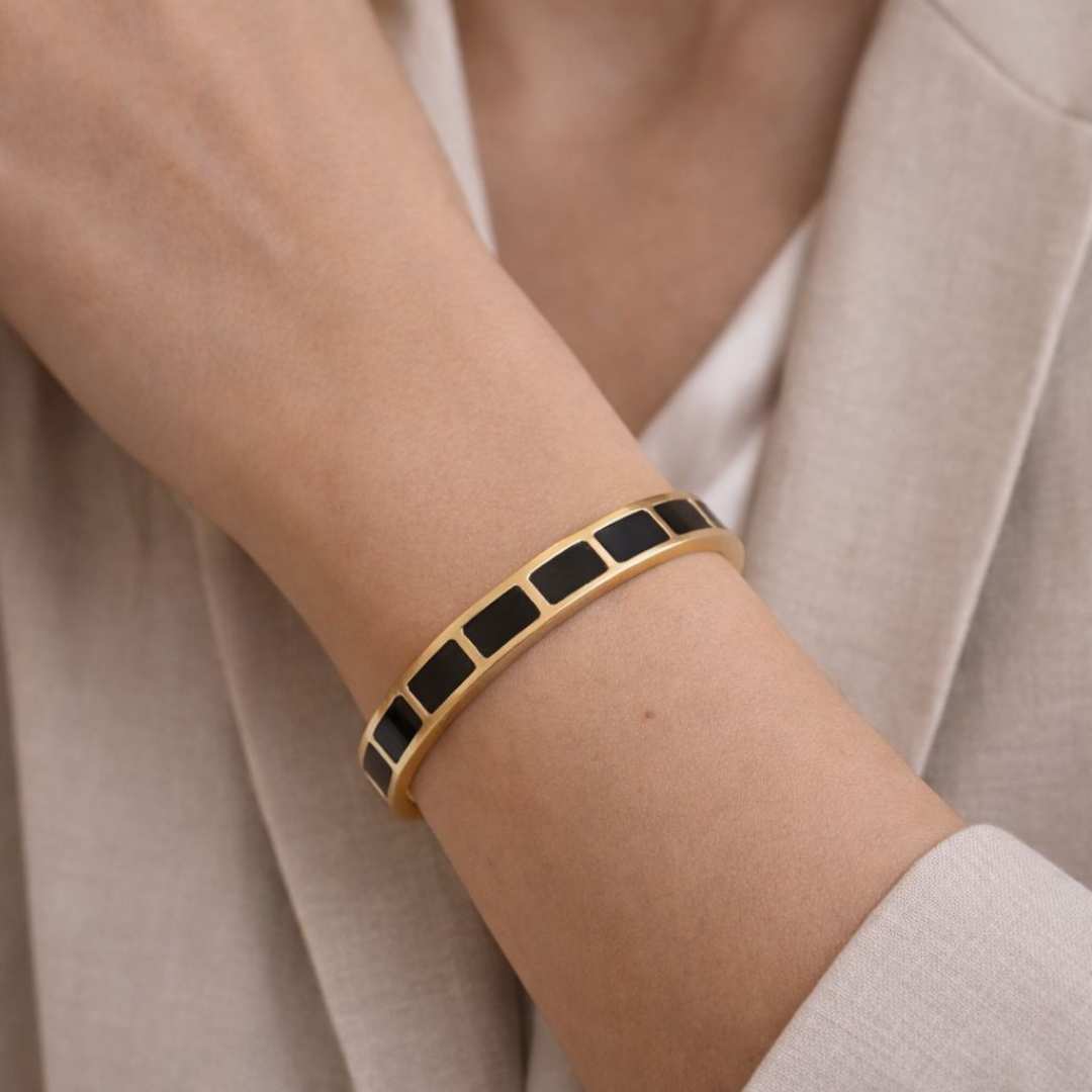 Carra Gold bracelet with black square stones from House of Pehr