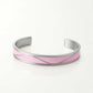 Silver bracelet with a pink band on a white background, Serena Bangles from House of Pehr