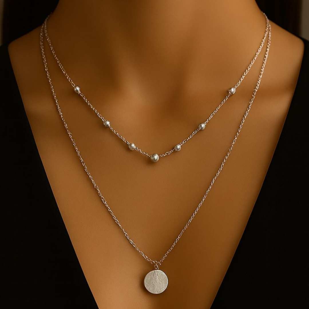 Elara Necklace with beads and circle charm from House of Pehr