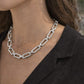 Silver chain necklace worn by a person from House of Pehr 