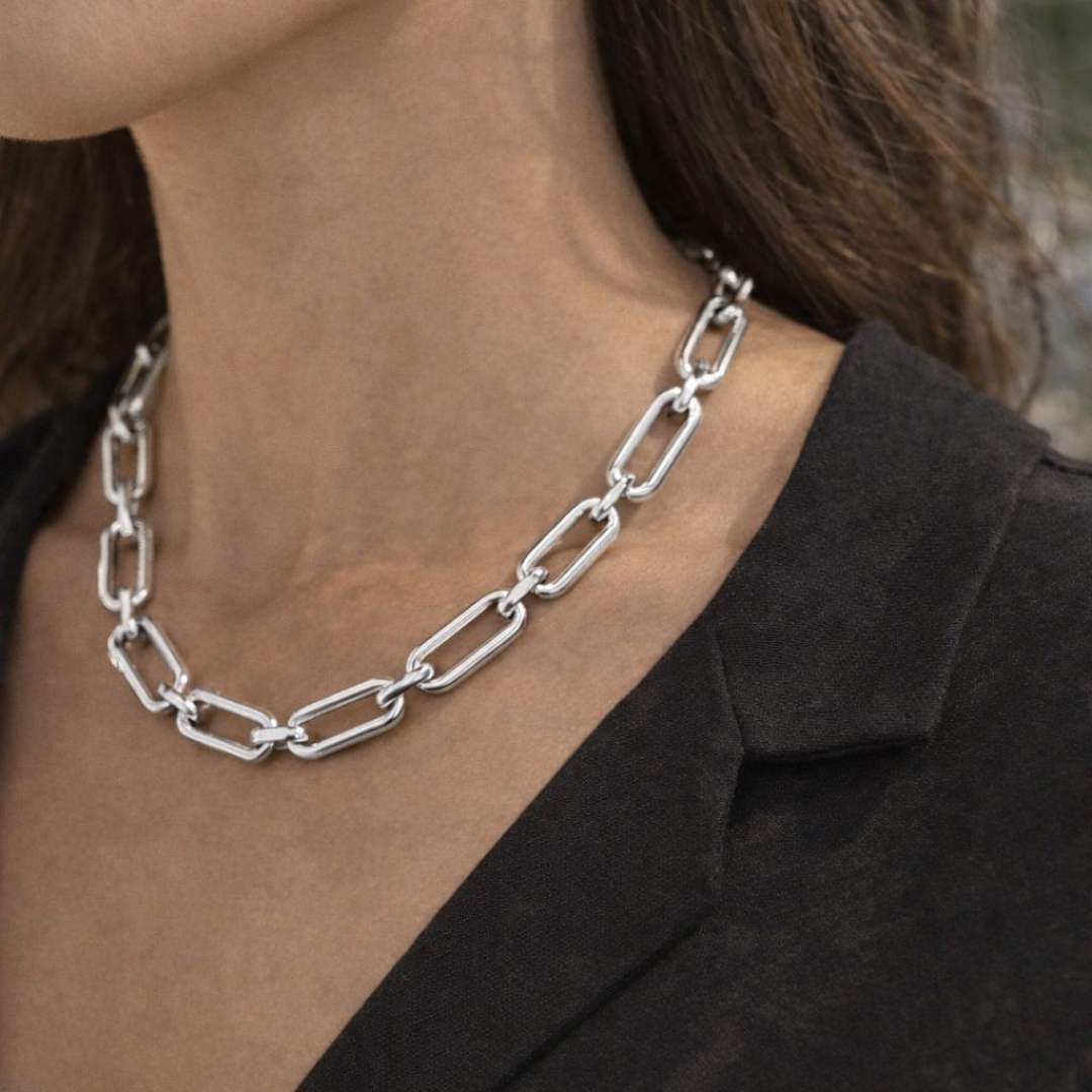 Silver chain necklace worn by a person from House of Pehr 