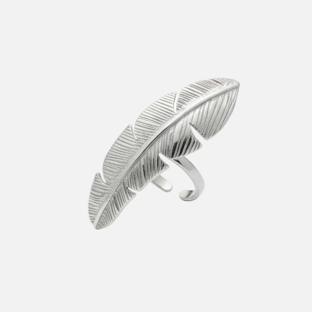 Silver feather-shaped ring on a white background, Zephyr Ring from House of Pehr - Image 1
