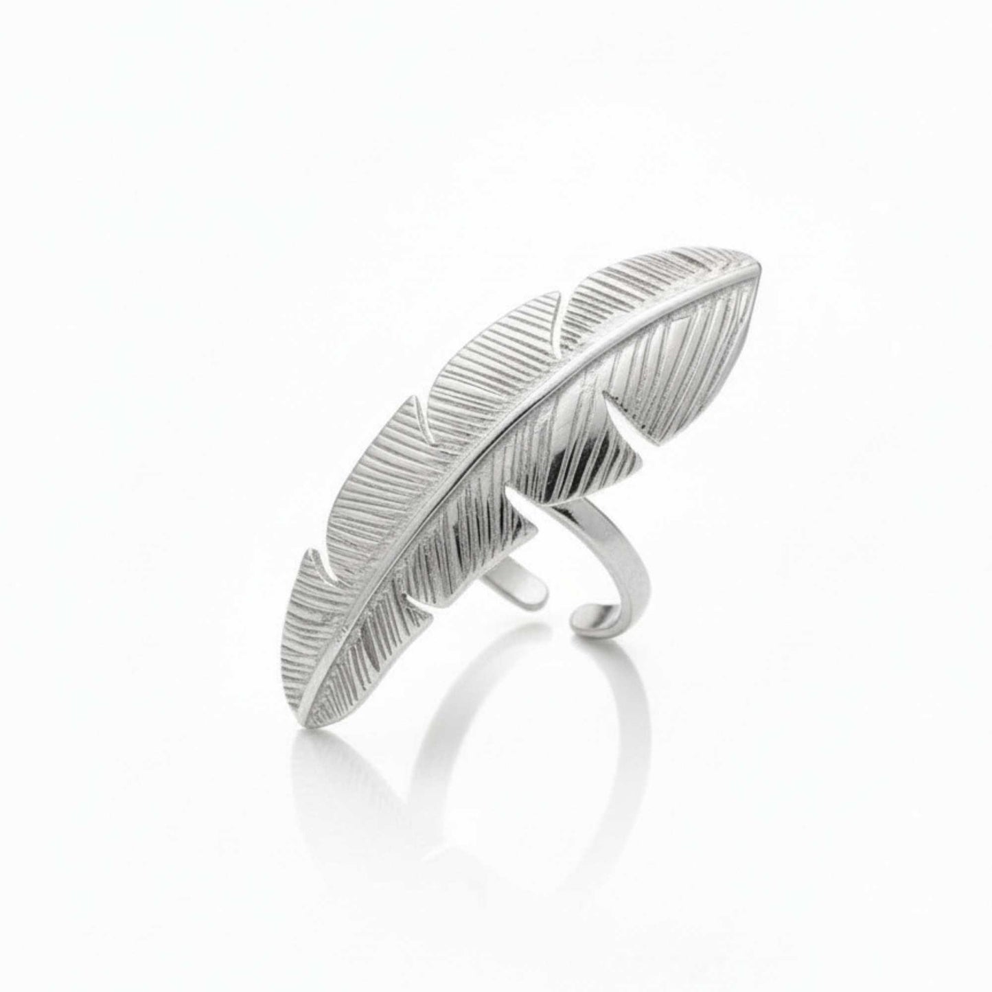 Silver feather-shaped ring on a white background, Zephyr Ring from House of Pehr