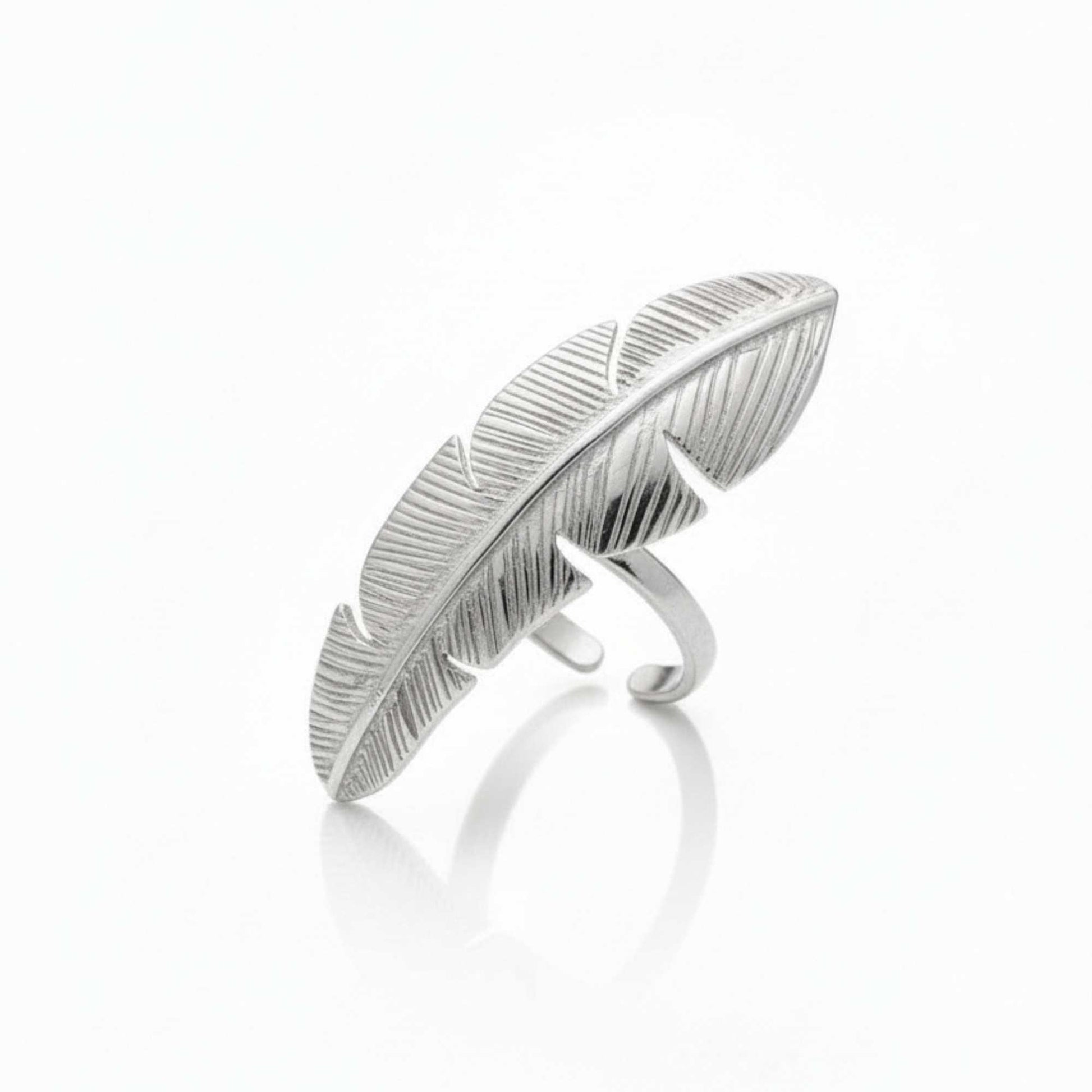 Silver feather-shaped ring on a white background, Zephyr Ring from House of Pehr