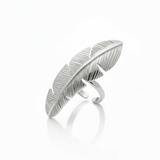 Silver feather-shaped ring on a white background, Zephyr Ring from House of Pehr