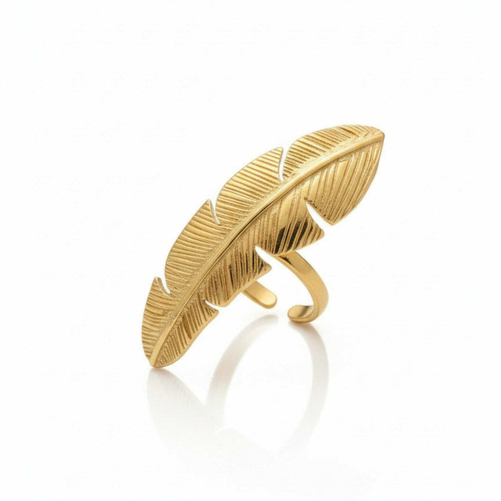 golden feather-shaped ring on a white background, Zephyr Ring from House of Pehr - Image 3