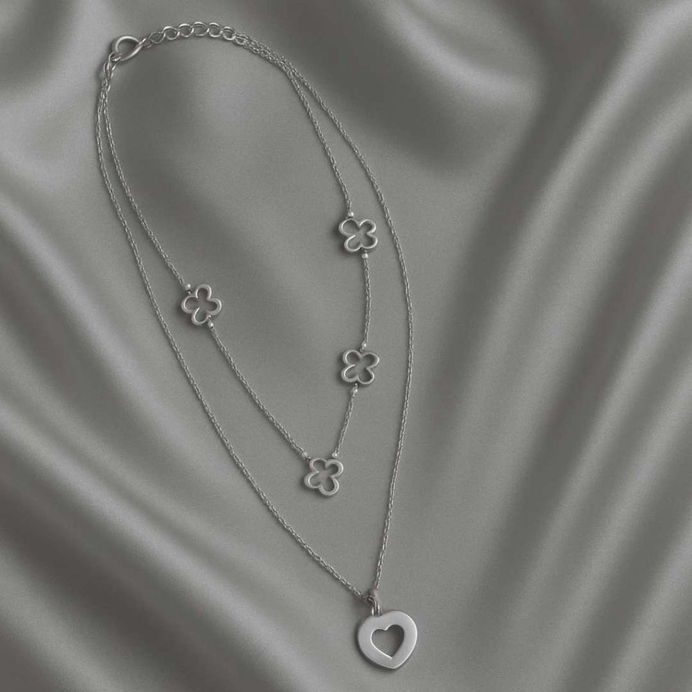 Amora Necklace from House of Pehr is a set of layered Silver plated necklaces with floral and heart motifs. - Image 5