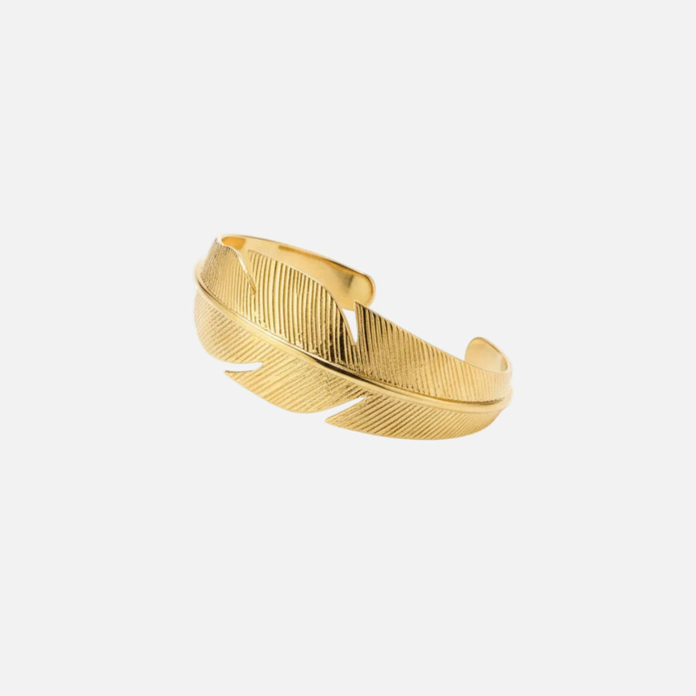 Gold feather-shaped cuff on a white background, Zephyr Cuff from House of Pehr - Image 5