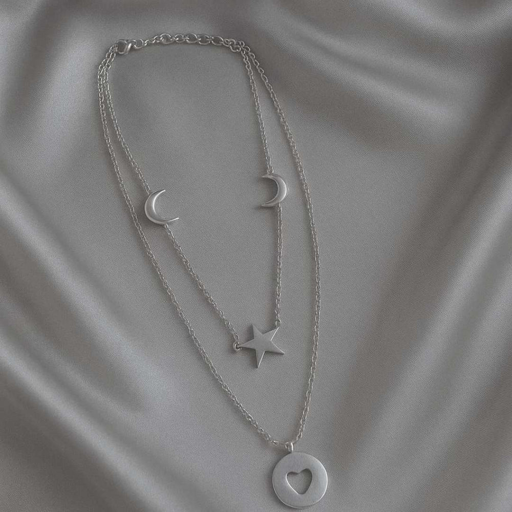 Celesta Necklace from House of Pehr is a layered set of silver plated necklaces with moon, star, and heart Motifs - Image 5