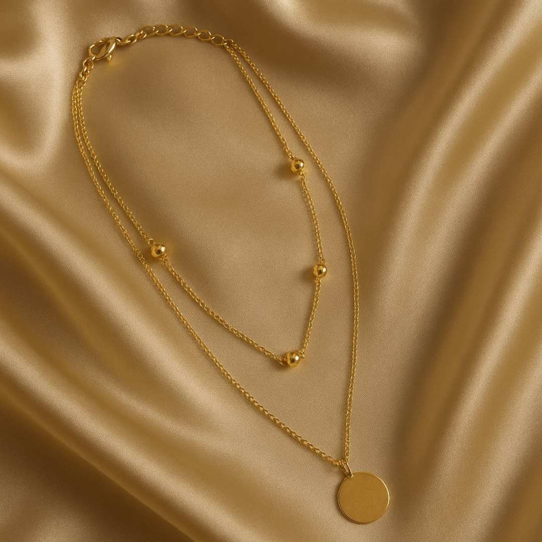 Elara Necklace with beads and circle charm from House of Pehr