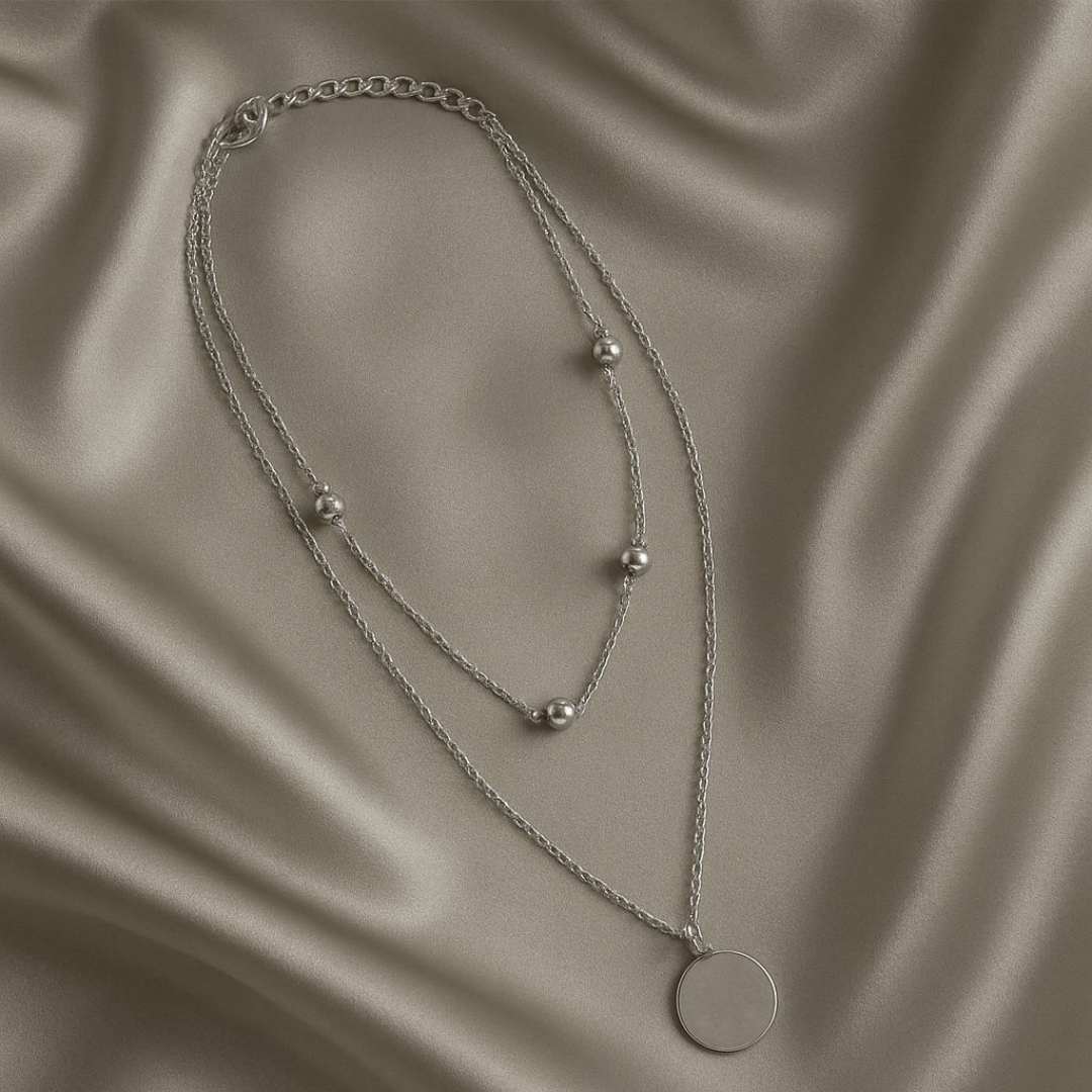 Elara Necklace with beads and circle charm from House of Pehr
