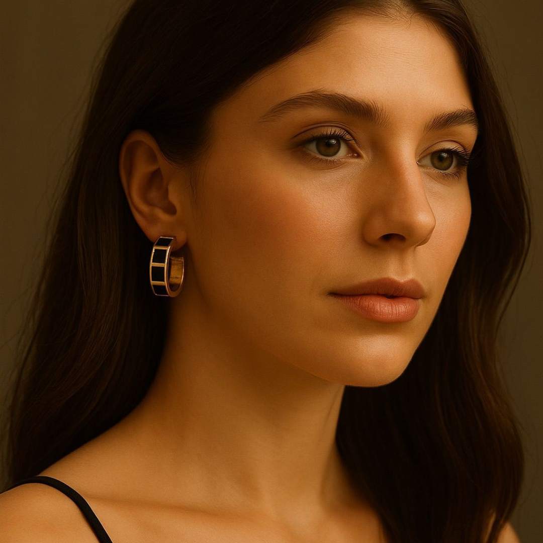 Carra Gold hoops earrings with black square pattern from House of Pehr
