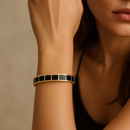 Carra Gold bracelet with black square stones from House of Pehr