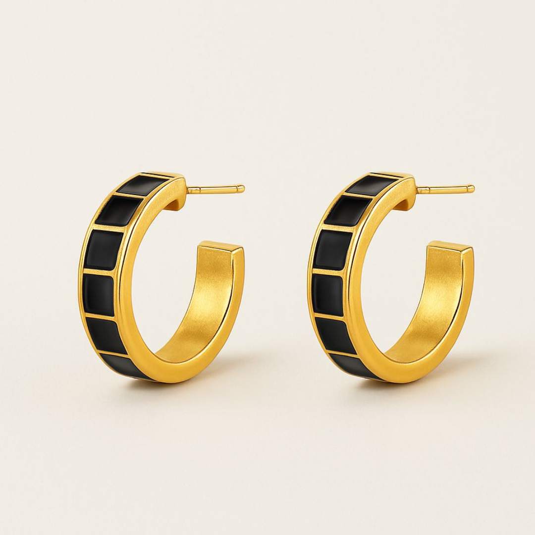 Carra Gold hoops earrings with black square pattern from House of Pehr