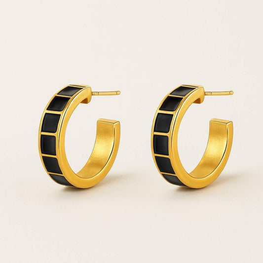 Carra Gold hoops earrings with black square pattern from House of Pehr