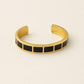 Carra Gold bracelet with black square stones from House of Pehr