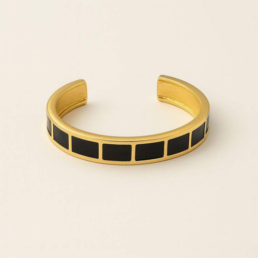 Carra Gold bracelet with black square stones from House of Pehr