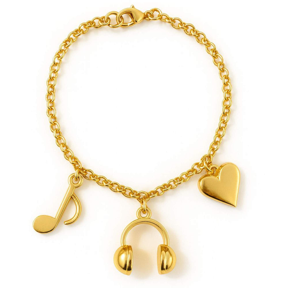 Gold bracelet with music note, heart, and headphone charms. Cadence Bracelet from House of Pehr - Image 2
