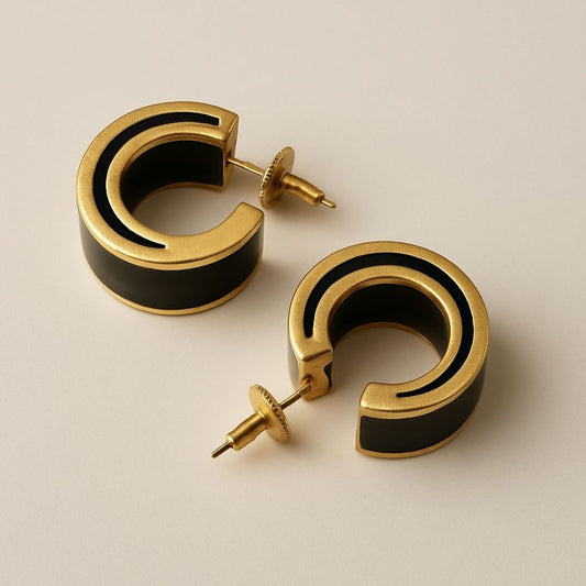 Gold Noire hoop earrings with black Inlay from House of Pehr