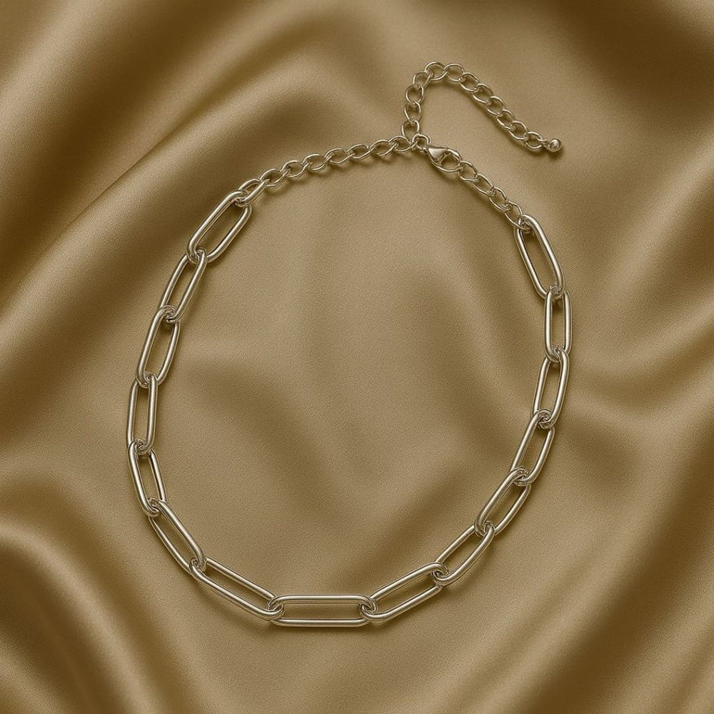 Numa Chain Silver necklace worn by a person in a beige suit against a neutral background from House of Pehr - Image 4
