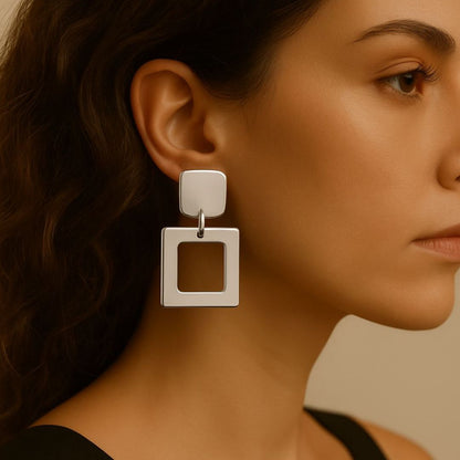 Numa Earrings are Silver geometric earrings from House of Pehr