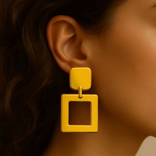 Numa Earrings are Golden geometric earrings from House of Pehr