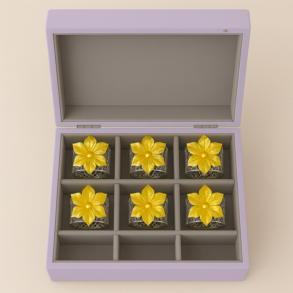 Blossom Napkin Rings - A set of napkin rings with silver and gold colors, featuring a floral design, displayed on a dining table from House of Pehr - Image 6