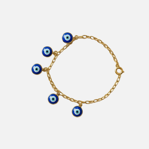 Gold bracelet with blue evil eye charms on a white background from House of Pehr