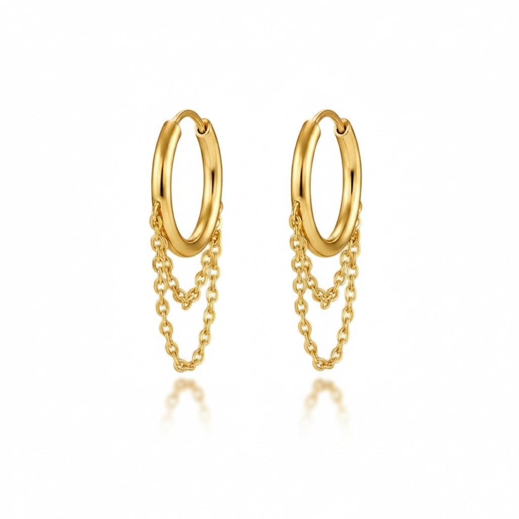 Gold hoop earrings with chain details on a white background